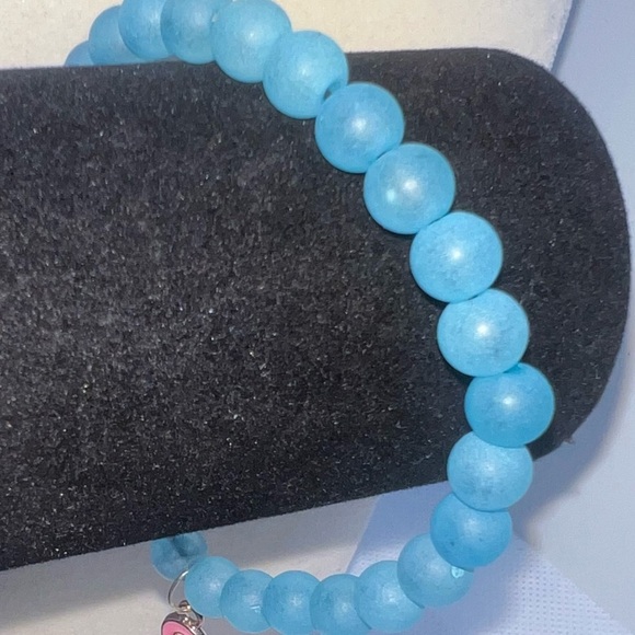 ♦️ 
Pink Ribbon Charm Blue Beaded Bracelet - Picture 3 of 3